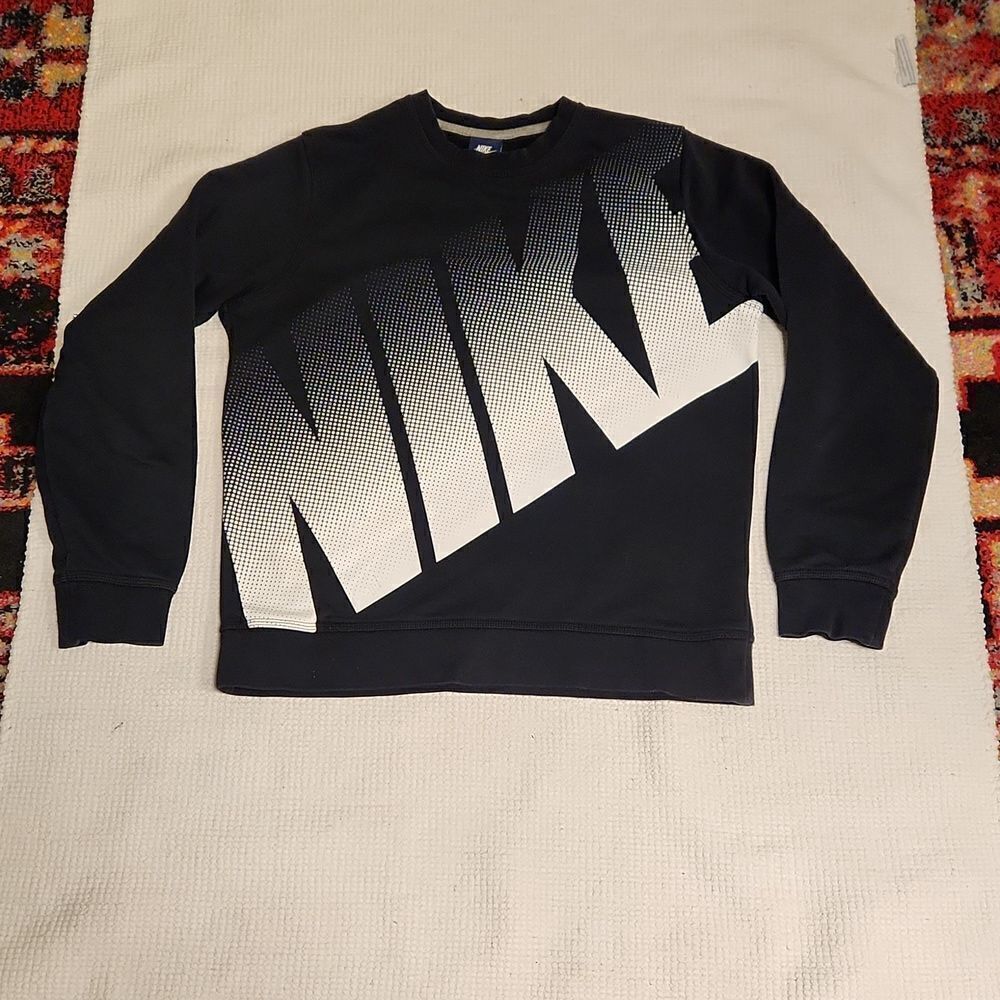 Nike black sweatshirt with white dotted bold logo at chest